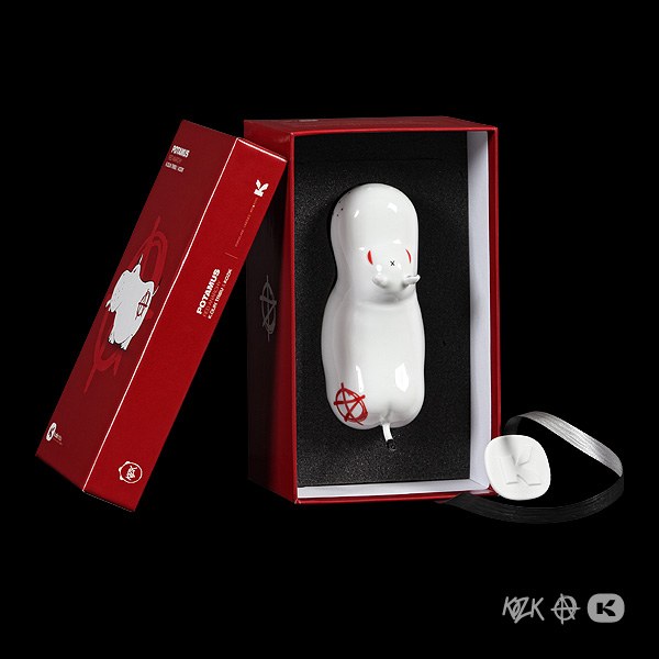 Potamus Red Anarchy figurine by Frank Kozik, crafted from Limoges porcelain, featuring a white enamel finish and red Anarchist logo.